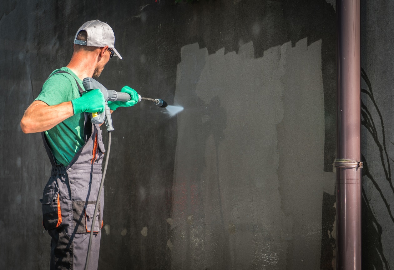 pressure cleaning a wall